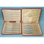 Two cased sets of silver pistol-handled fruit knives, Thomas Bradbury & Sons, Sheffield 1915,