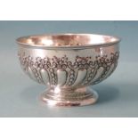 A small silver rose bowl with embossed decoration, London 1898, 12.5cm diameter, 7cm high, ___5.2oz.