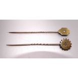 A Victorian 15ct gold stick pin set diamond, 2.3g and another set old-cut diamond in gold-faced