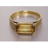 A citrine-set gold ring, (citrine worn), the mount bearing Middle Eastern marks for 18ct gold,