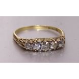 A Victorian five-stone diamond ring set old brilliant-cut diamonds with diamond points between, in