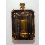 A very large citrine pendant, 28 x 21 x 15mm, in gold mount bearing Middle Eastern marks for 18ct