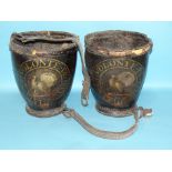 A pair of early leather fire buckets painted with crest and motto, a turkey cock and "A La Volonte