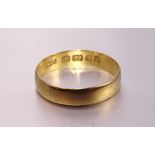 A 22ct gold wedding band, size P, 2.6g.