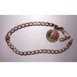 A 9ct gold bracelet of flattened curb links, with St Christopher medallion, 21cm, 9.2g.