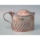 A Victorian silver oval mustard pot with gadrooned decoration and blue glass liner, Walker & Hall,