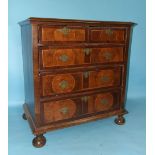 A William & Mary walnut crossbanded chest of two short and three long drawers, on bun feet, 81cm
