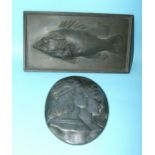 A rectangular copper plaque relief-moulded with a coelacanth, 22.5 x 12.5cm and a moulded pewter