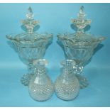 A pair of 19th century glass vases and covers, each knopped cover and inverted bell shape body on