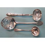 A Mappin & Webb silver loving spoon with scroll-pierced bowl and heart-shaped pierced handle, London