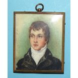 Dorothy Bartlett (b. 1902) An early-20th century portrait miniature of a young man wearing a white