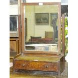 An oak dressing table mirror in the style of Heal & Son, with plain rectangular plate and single
