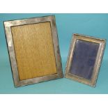 A silver photograph frame of rectangular form, 18.5 x 13.5cm, Birmingham 1909 and another, larger,