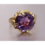 A yellow gold ring set synthetic purple sapphire, bearing Egyptian marks for 18ct gold, size M, 4.