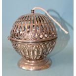 A silver string box of pierced spherical form, makers Thomas Eady & Co. Ltd, London 1905, ___3.36oz.