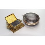 A Victorian small gold locket in the form of a casket with engraved scroll decoration, base 12 x
