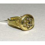 A Victorian mourning ring set rose-cut diamond and demi-pearl cluster, (one pearl setting vacant,