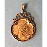 An Elizabeth II half-sovereign, 1982, in 9ct gold pendant mount, 6.5g.