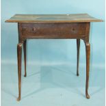 An 18th/19th century rustic country-made side table fitted with a single drawer, on slender turned