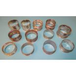 Twelve various silver napkin rings, Victorian and later ___6.7oz.