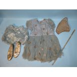 A 1940's fairy dress of blue net, with appliqué silver sequin and bullion stars, frilly bloomers,