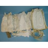 Thirteen vintage gentleman's cotton dress shirts with pleated or starched bibs, eleven collars and