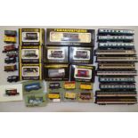 Graham Farish N gauge, six boxed wagons, eight unboxed coaches, three Peco coaches and eighteen