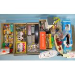 A quantity of OO gauge station accessories by Britains, Merit, Husky, an Autocraft metal ambulance