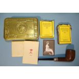 A WWI Princess Mary gilt tin 1914 designed by Prof. Stanley Adshead, with original packets of