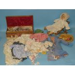A quantity of dolls' clothes, many commercially-made, including "Winifred Cookman", a doll's