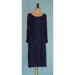 Mingolini Gugenheim, a 1960's couture cocktail dress of navy blue lace, hand-embellished with