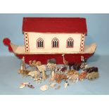 A carved and painted wood Noah's Ark, similar to those made by disabled ex-servicemen, with Mr & Mrs