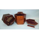 A Lachenal & Co. 33-button concertina, with pierced foliate rosewood ends, six-fold leather and
