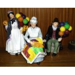 Three Royal Doulton figurines: 'Biddy Penny Farthing' HN1843, 'The Balloon Man' HN1954 and '