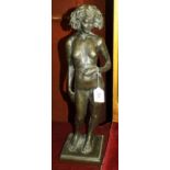 R Moll, a contemporary bronzed cold-cast resin sculpture of a naked female figure standing, signed R