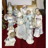 A collection of seven Nao figurines, two Nadal figurines and eight others, (17).