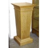 A craftsman-made oak pedestal of square tapering form, top 40.5cm square, 92cm high.