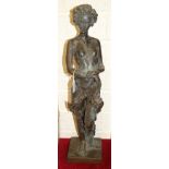 R Moll, a contemporary bronzed cold-cast resin sculpture of a naked female figure standing, signed R