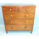 A late-Victorian mahogany straight-front chest of two short and three long drawers, on turned