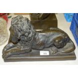 R Moll, a contemporary bronzed cold-cast resin sculpture of a recumbent lion, 31cm long, 18cm