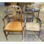 Three late-19th century stained wood-seat kitchen chairs, one other, a carved oak hall mirror with