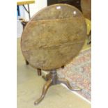 A mainly-18th century circular tilt-top table on barrel column and tripod base and a corner