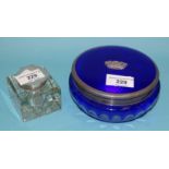 A blue and clear glass dressing table jar with silver and blue enamelled cover and central applied