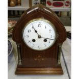 A French inlaid mahogany striking mantel clock, the movement stamped Japy Freres, 26cm high, a brass