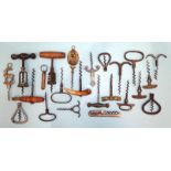 A collection of eight wooden-handled corkscrews, including 'Hercules', three horn-handled corkscrews