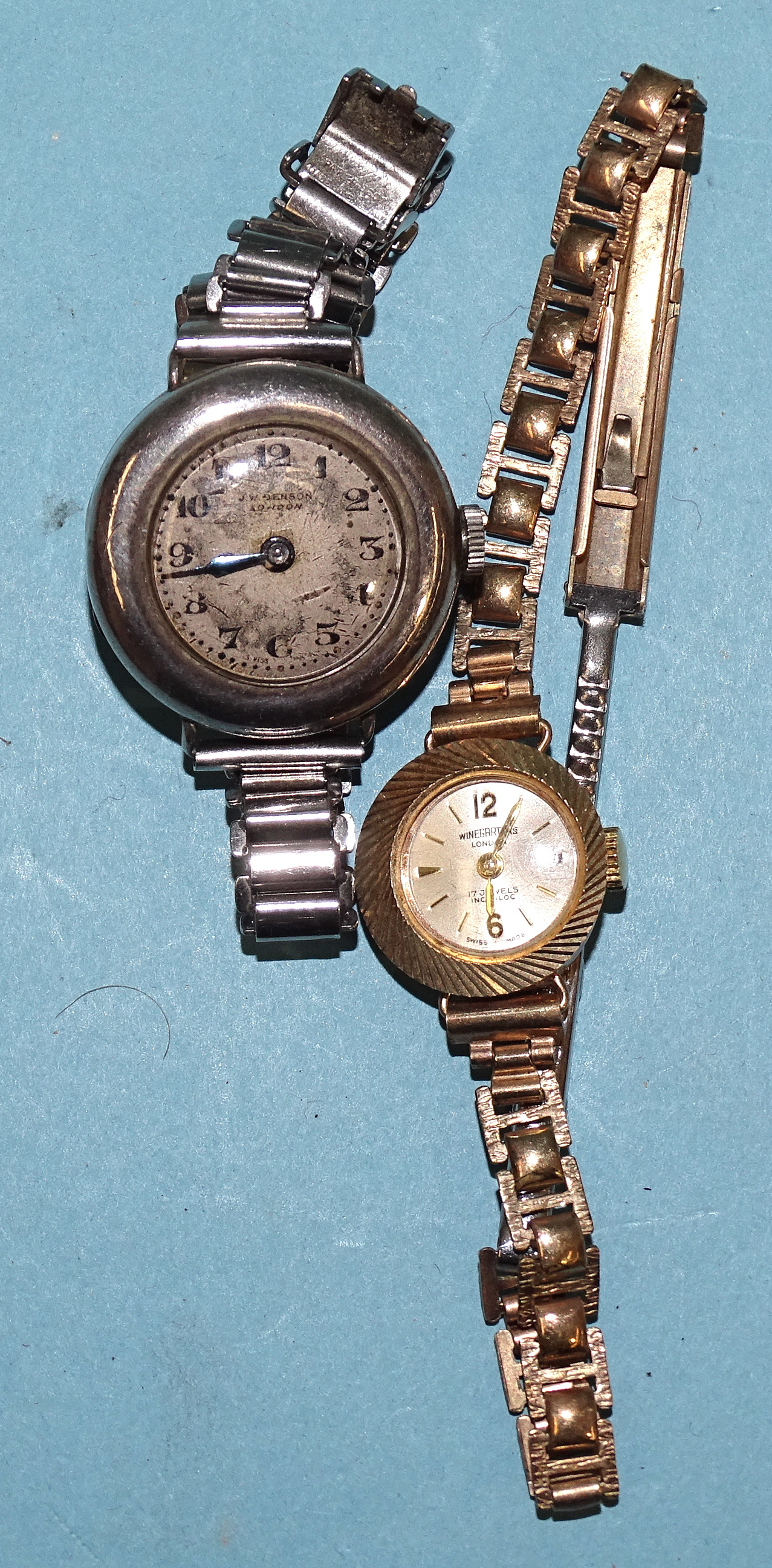 A lady's 9ct gold-cased wrist watch on plated bracelet and a lady's silver-cased wrist watch