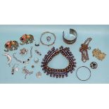 A quantity of costume jewellery and fashion wrist watches.