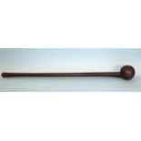 A tribal hardwood club or knobkerrie, 69cm long.