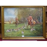 S K Mitchell HUNTING SCENE - HUNTSMEN ON HORSEBACK WITH A PACK OF HOUNFDS GALLOPING ACROSS A FIELD