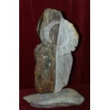 Bridget Dumper MA (Sculpture) SWA, a partially-polished stone sculpture, untitled, on natural
